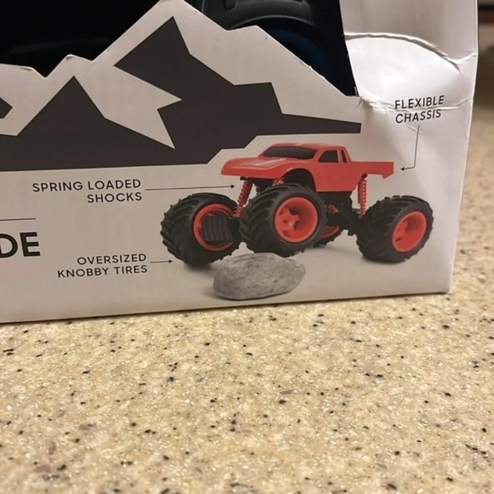 Brand New Sharper Image Remote Control Mini Monster Truck Rockslide Blue Toy